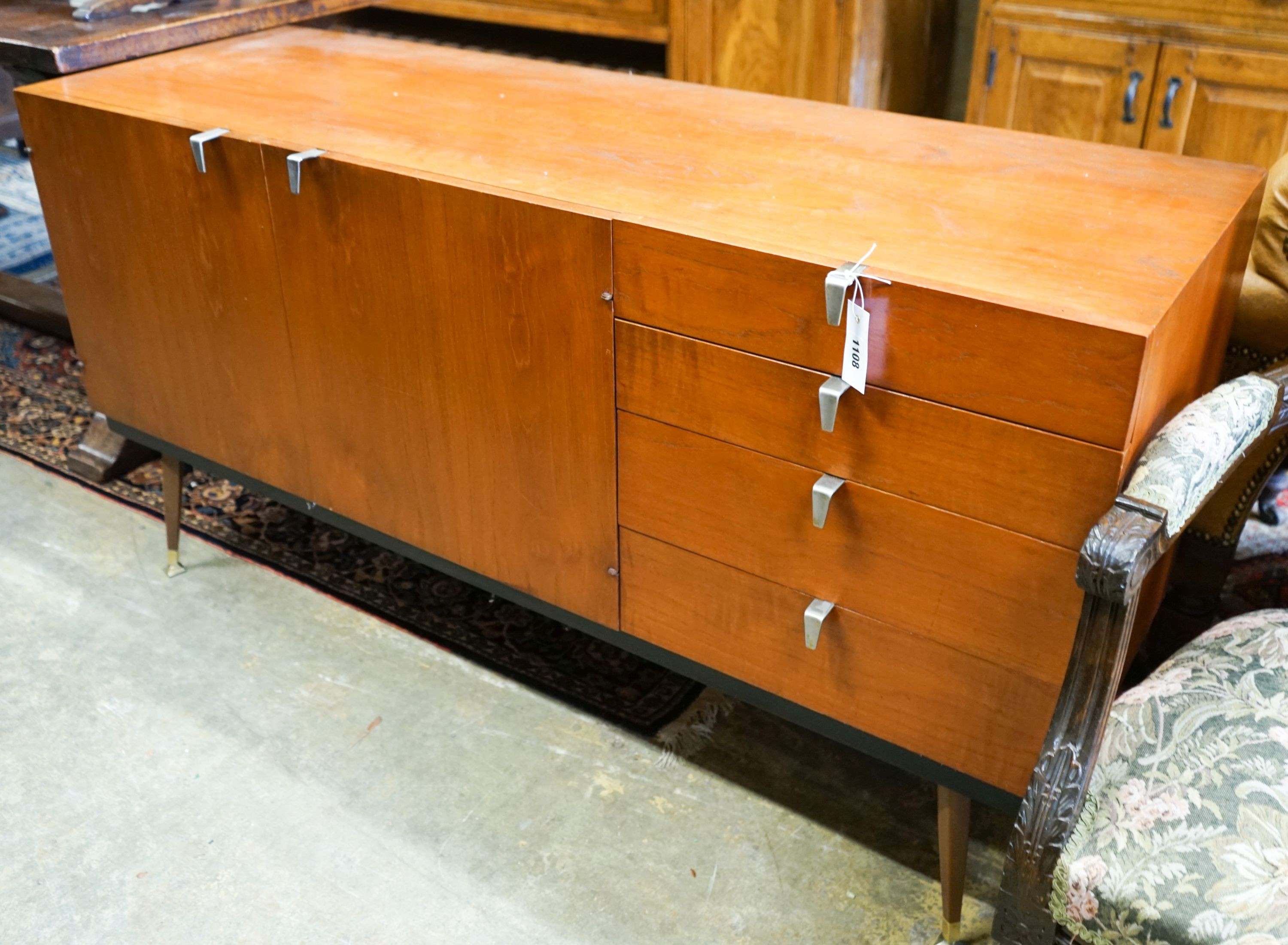 A mid 20th century Stag teak sideboard, length 137cm, depth 48cm, height 73cm